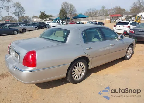 2004 Lincoln Town Car Signature z USA, uszkodzony, nr VIN 1LNHM81W34Y632812